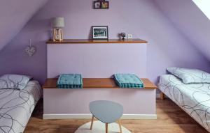 Ένα ή περισσότερα κρεβάτια σε δωμάτιο στο Maison Campagne Normandie