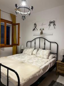 En eller flere senge i et værelse på Ferienhaus Costa Almeria