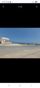 a view of an airport runway with a blue sky at Farah in Sousse