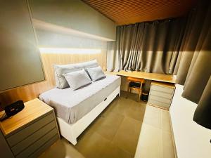 Postel nebo postele na pokoji v ubytování Ap Jardins Luxury Pamplona Masp 209