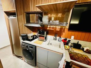 Kuchyň nebo kuchyňský kout v ubytování Ap Jardins Luxury Pamplona Masp 209 + 78 fotografií