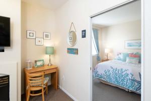 Кровать или кровати в номере After Dune Delight