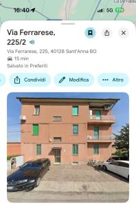 a screenshot of a building with a car parked in front at B&B Le Palme Fiera in Bologna