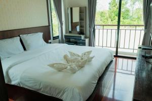 Postel nebo postele na pokoji v ubytování Baan Viset Pool Villa Krabi + 41 fotografií