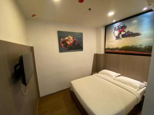 Ένα ή περισσότερα κρεβάτια σε δωμάτιο στο Arafah Hotel +10 φωτογραφίες