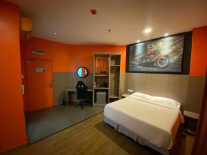 Ένα ή περισσότερα κρεβάτια σε δωμάτιο στο Arafah Hotel