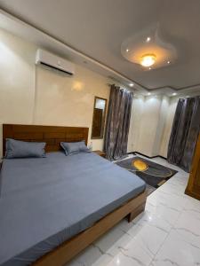 Ένα ή περισσότερα κρεβάτια σε δωμάτιο στο Appartement Duplex indépendant