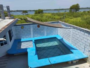 a swimming pool on the roof of a house at Casa Mia in Cedro +7 photos