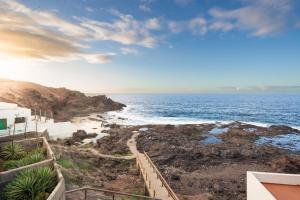 a view of the ocean from a house at Ocean views "Las Garzas" in Sardina