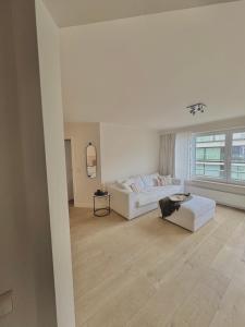 Postel nebo postele na pokoji v ubytování Apartment Knokke vlakbij strand