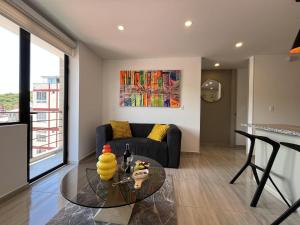 Posezení v ubytování Moderno con ascensor y parqueadero a 5 min del CC + 9 fotografií