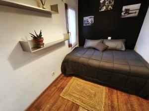 En eller flere senge i et værelse på La casa Calabaza + 25 billeder