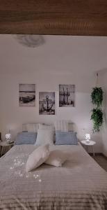 Postel nebo postele na pokoji v ubytování Appartamento Perla Marina