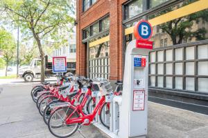 a row of bikes parked in front of a building at The 333 Suites 301 - Suite for 6 in Cincinnati