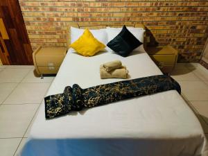 Ένα ή περισσότερα κρεβάτια σε δωμάτιο στο 14 Mirage crescent