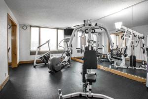 a gym with several exercise equipment in a room at Holiday Inn Chicago Midway Airport S by IHG in Chicago +47 photos