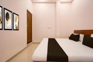 Ένα ή περισσότερα κρεβάτια σε δωμάτιο στο Hotel O Haven Palace