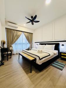 Ένα ή περισσότερα κρεβάτια σε δωμάτιο στο Agile Residence Bukit Bintang