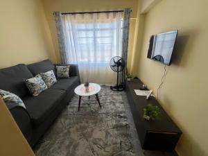 Una televisión o centro de entretenimiento en The R&M Escapes