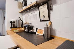 a kitchen counter with a coffee maker on it at Ca Du Grifun - Vernazza in Vernazza