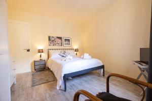 Postel nebo postele na pokoji v ubytování Kalkara 4