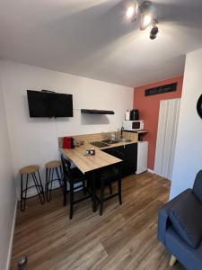 Η κουζίνα ή μικρή κουζίνα στο Appartement avec terrasse