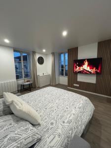 Ένα ή περισσότερα κρεβάτια σε δωμάτιο στο Bright studio 9 minutes from Disneyland Paris