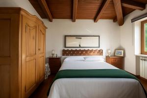 Postel nebo postele na pokoji v ubytování Villa Nasca - Paesaggi e Piscina privata