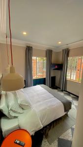 Ένα ή περισσότερα κρεβάτια σε δωμάτιο στο Bendito Hostels