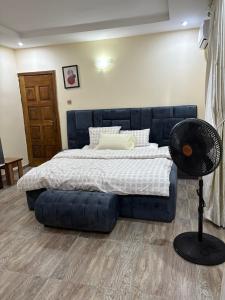 Postel nebo postele na pokoji v ubytování Bollington Adex house