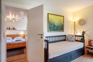 Postel nebo postele na pokoji v ubytování Haus Frölich