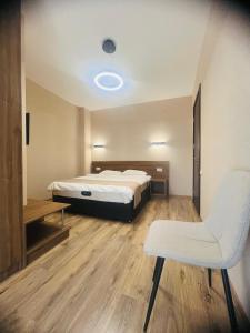 Ένα ή περισσότερα κρεβάτια σε δωμάτιο στο Bakunin CRYSTAL RESORT