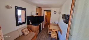 Televiisor ja/või meelelahutuskeskus majutusasutuses Studio Valfréjus, pied des pistes