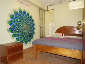 Postel nebo postele na pokoji v ubytování Coca Runa Wasi Hostel