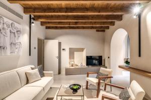 a living room with a couch and a table at Agnesi Statue in Milan +288 photos