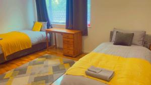 Ένα ή περισσότερα κρεβάτια σε δωμάτιο στο Maxismile Haven