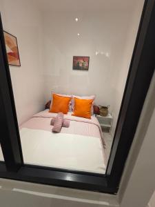 Postel nebo postele na pokoji v ubytování Nid douillet Le Raincy proche Paris et Stade de France de Saint Denis