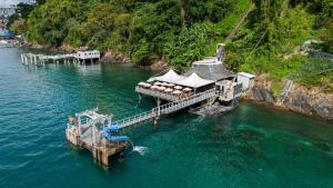 an aerial view of a dock in the water at Studio-Apartment Center Pool Free Parking in Salvador