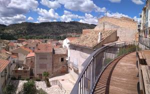 a view of a city with a bridge and buildings at Casa cova de Benifallet in Benifallet