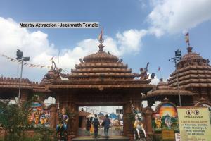 a temple with people standing in front of it at Hotel O New Banjara Residency in Hyderabad