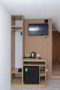 TV a/nebo společenská místnost v ubytování Pansion A&M Vlašić