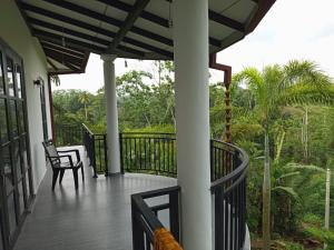 Μπαλκόνι ή βεράντα στο TG Home Stay Villa Ahnagama +9 φωτογραφίες
