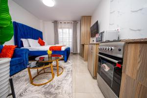 Η κουζίνα ή μικρή κουζίνα στο Marina Cozy guest house