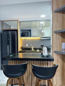 Køkken eller tekøkken på Apartamento novo e completo