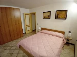 Postel nebo postele na pokoji v ubytování VillaAurora