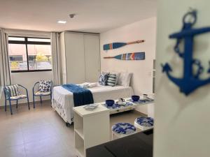 Ένα ή περισσότερα κρεβάτια σε δωμάτιο στο Refúgio do Marujo