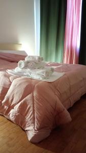 Ένα ή περισσότερα κρεβάτια σε δωμάτιο στο Home