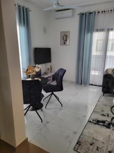 Et tv og/eller underholdning på Résidence Perla