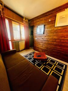 Μια τηλεόραση ή/και κέντρο ψυχαγωγίας στο Stella Alpine Apartment - Prato nevoso