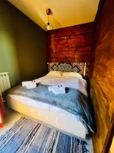 Ένα ή περισσότερα κρεβάτια σε δωμάτιο στο Stella Alpine Apartment - Prato nevoso